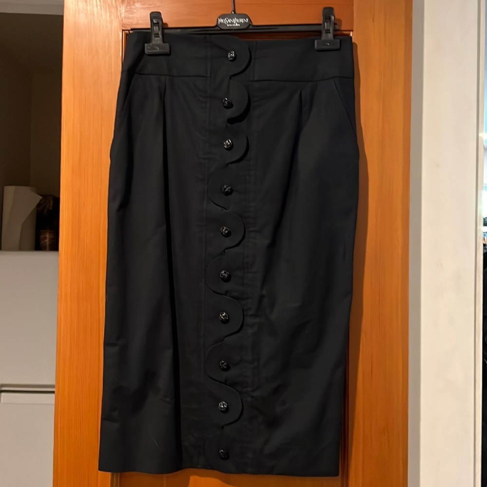 YSL! Rive Guache pencil skirt in black with bird carving buttons.